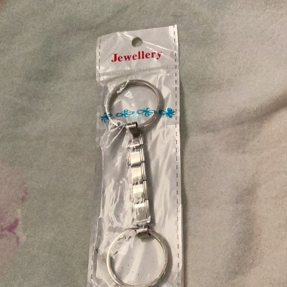 Elegant Silver Keychain with Blue Detail